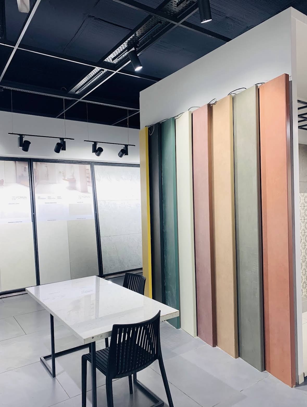 Wall of pastel coloured tile samples